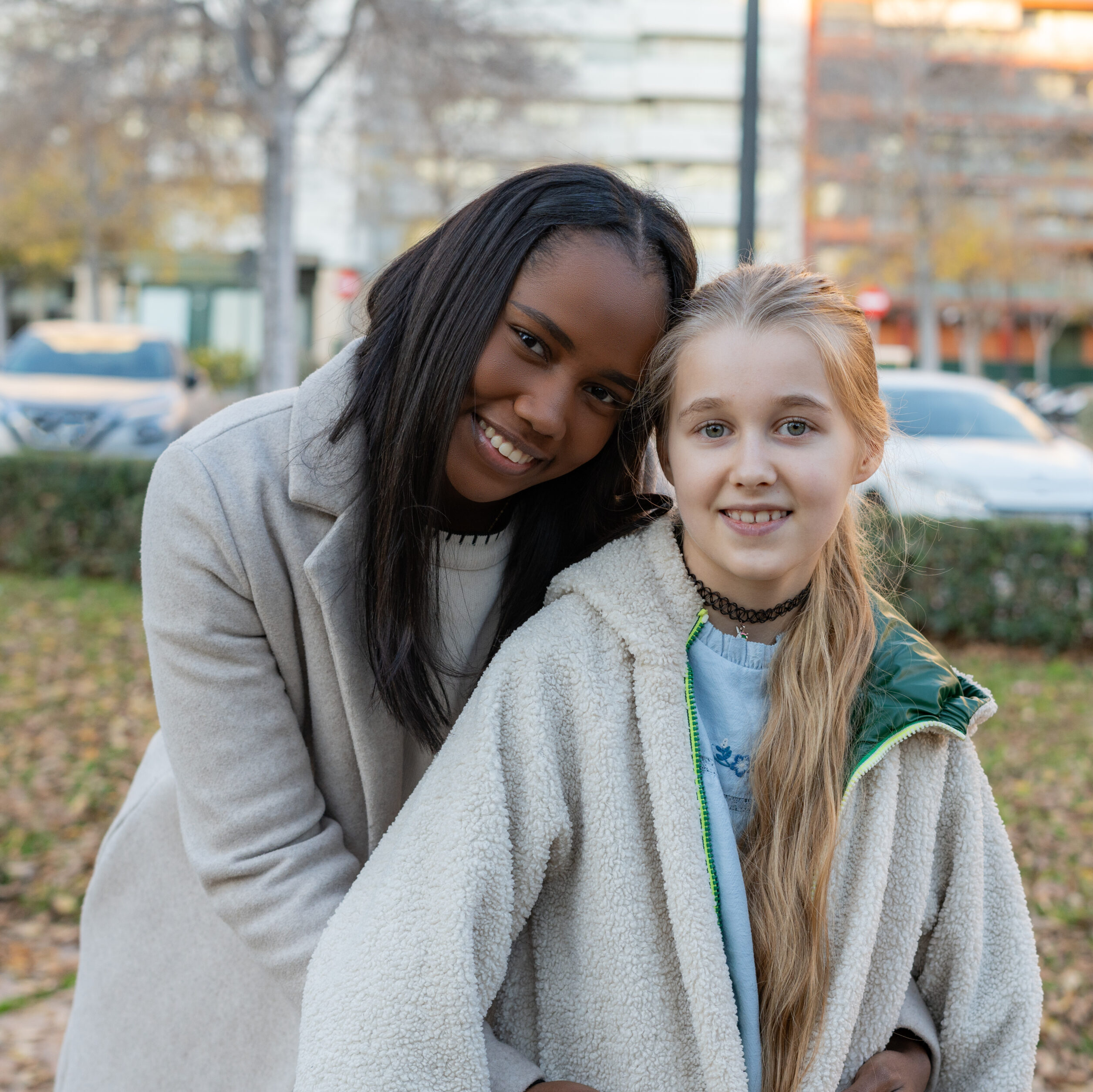 Two young women, an older teenager and a younger teenager.