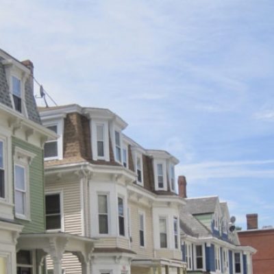 MFP-program-update A row of triple-decker style houses in Boston.