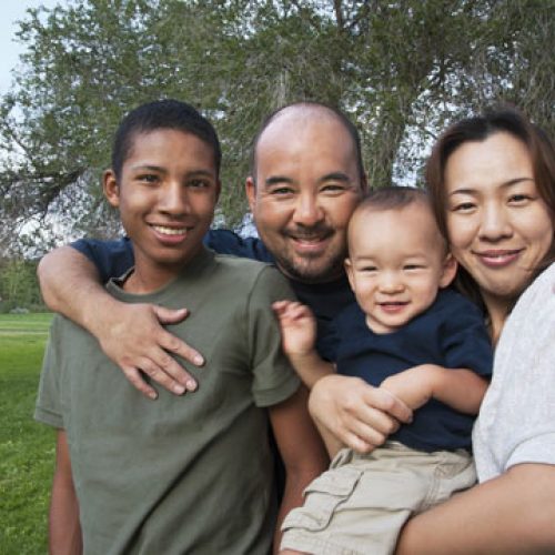 foster-family-AAPI A blended foster family with a mom, a dad, and 2 sons.